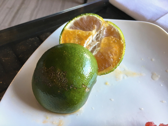 Cam sanh, the local citrus.  Not very good.