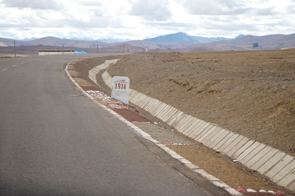 Beautifully built road, but  red- and white-painted stones act as reflectors.