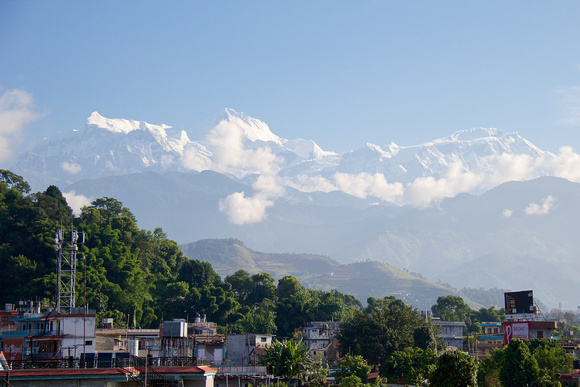 Annapurna IV (7,525m/24,688ft) on L and Annapurna II (7,937m/26,040ft) in center.  From roof of our hotel.