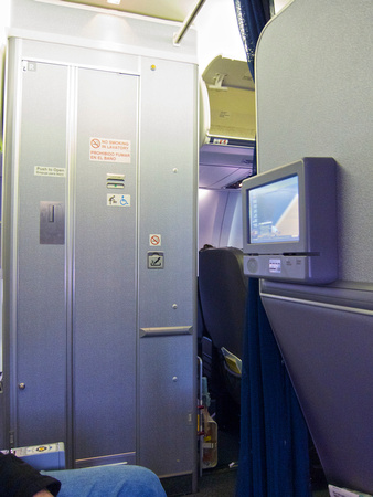 Front lavatory for economy, across from row 7 on CO's 739.