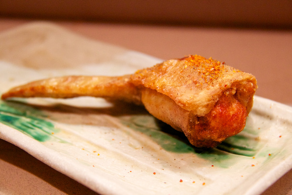 Chicken wing stuffed with mentaiko (明太子).  Speciality of Hakata.