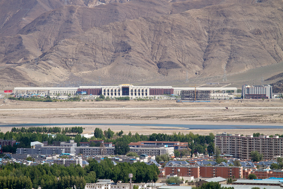 The massive train station across the river from Drepung Monastery, few km west of city center.