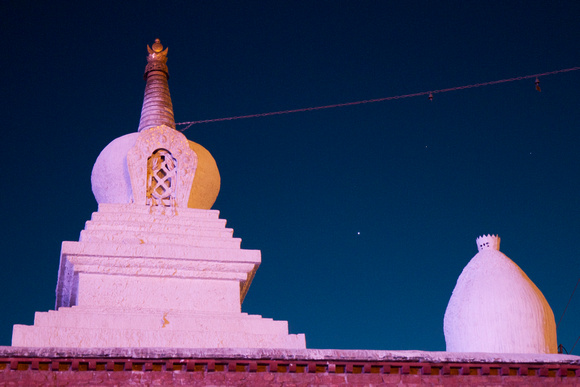 The white chorten doesn't look too white at night.