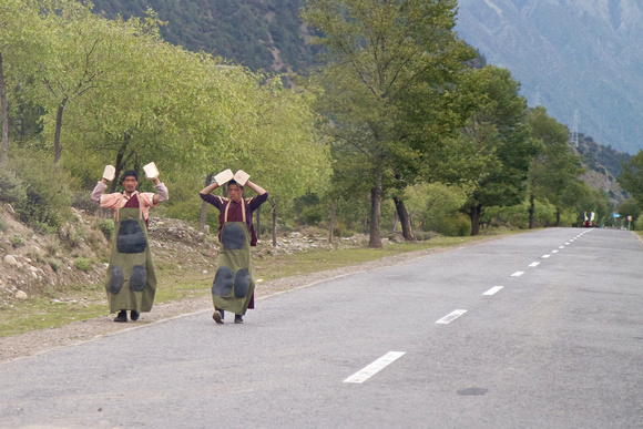 Pilgrims heading towards Lhasa, about 300km/180mi away.   May take them years.