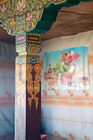 Tibetans hire special craftsmen to decorate their pillars.   Colors last forever.