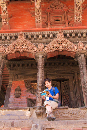 Resting on the steps of one of the several temples in Durbar Sq.