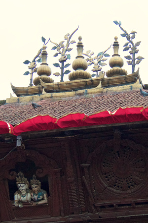 Close up of the Shiva (left) and his consort Parvati on their temple.