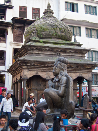 Statue of Garuda (c1690) and Bimaleshwor Temple.