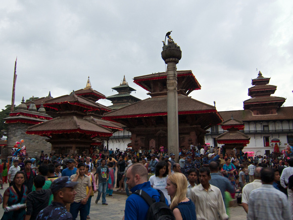 Column of King Pratap Malla (1624-74, reigned 1641-74).  On far left is the Yosin pole which marks the Indra Jatra festival.