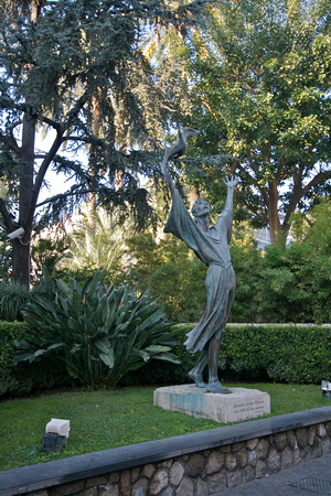 Bronze sculpture by Alfiero Nena (1922), across the church.