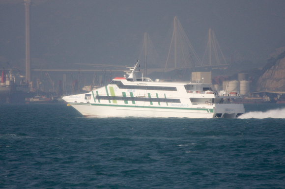 "Discovery Bay 5" taking commuters home.  Ting Kau Bridge in background.